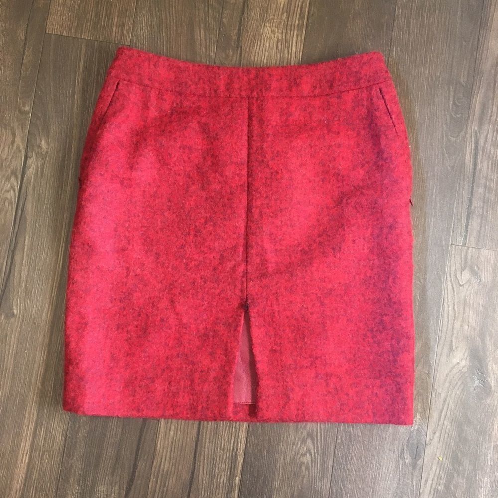 Akris two tone red wool pencil skirt, front slit with faux leather panel behind